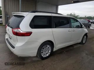 2016 Toyota Sienna XLE with VIN 5TDYK3DC8GS729616, listed as a Copart auction lot 59748995 with 144,469 mi miles and Salvage title. Bid and sale history available at DreamBid. Image 3.