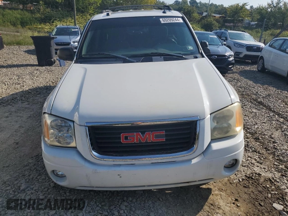 2005 GMC Envoy SLT with VIN 1GKDT13S552329269, listed as a Copart auction lot 69209244 with 154,595 mi miles and Salvage Title. Bid and sale history available at carsss.com. Image 5.