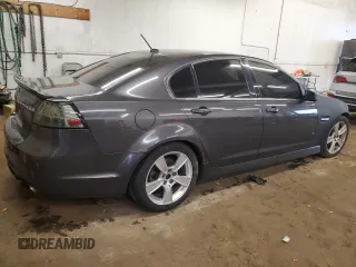 2009 Pontiac G8 z VIN 6G2ER57739L205634, wystawiony jako Copart lot #58935145 z przebiegiem 181 490 mil mil oraz Czysty tytuł • Clean title. Historia ofert i sprzedaży dostępna na DreamBid. Obrazek 3.