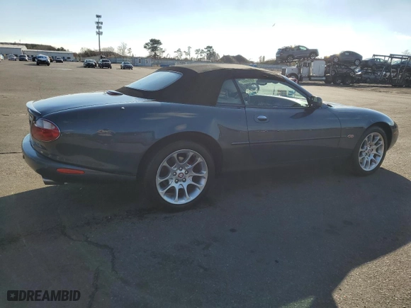2001 Jaguar XK8 with VIN SAJDA42B91PA15291, listed as a Copart auction lot 80018934 with 68,009 mi miles and Salvage Title. Bid and sale history available at carsss.com. Image 3.