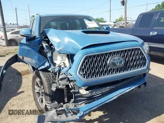 2019 Toyota Tacoma SR with VIN 3TMCZ5AN0KM272400, listed as a IAAI auction lot 42010954 with 76,531 mi miles and . Bid and sale history available at DreamBid. Image 1.
