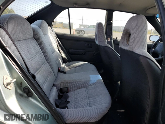 1994 Toyota Tercel DX z VIN JT2EL43T6R0457122, wystawiony jako Copart lot #54426595 z przebiegiem 201 177 mil mil oraz Czysty tytuł • Clean title. Historia ofert i sprzedaży dostępna na DreamBid. Obrazek 10.