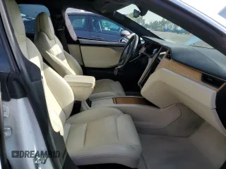 2019 Tesla Model S 100D with VIN 5YJSA1E44KF335113, listed as a Copart auction lot 82936844 with 89,770 mi miles and Salvage title. Bid and sale history available at DreamBid. Image 7.