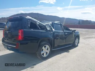 2015 Chevrolet Suburban LTZ with VIN 1GNSKKKC9FR280390, listed as a IAAI auction lot 41882449 with 80,499 mi miles and . Bid and sale history available at DreamBid. Image 4.
