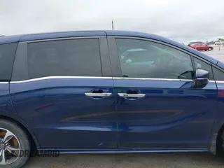 2018 Honda Odyssey Touring with VIN 5FNRL6H85JB001501, listed as a IAAI auction lot 41911497 with 92,407 mi miles. Bid and sale history available at carsss.com. Image 13.