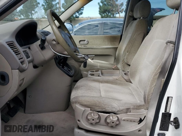2005 Kia Sedona LX with VIN KNDUP132356623195, listed as a Copart auction lot 46623545 with 173,049 mi miles and Salvage Title. Bid and sale history available at carsss.com. Image 7.