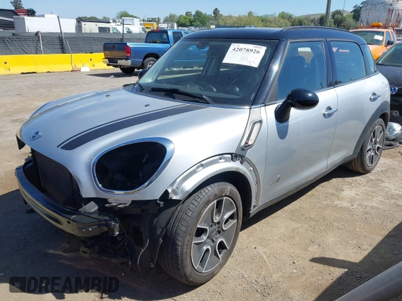 2012 MINI Countryman S with VIN WMWZC5C59CWL60076, listed as a IAAI auction lot 42078926 with 60,280 mi miles and . Bid and sale history available at DreamBid. Image 2.