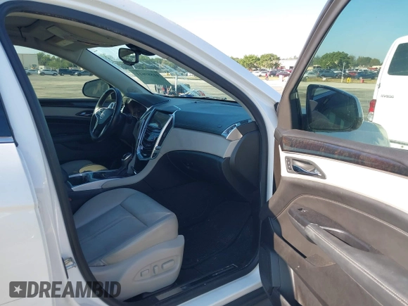 2016 Cadillac SRX Luxury Collection with VIN 3GYFNBE39GS548327, listed as a IAAI auction lot 41889611 with 140,670 mi miles. Bid and sale history available at carsss.com. Image 5.