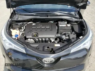 2018 Toyota C-HR XLE z VIN NMTKHMBXXJR024077, wystawiony jako Copart lot #53398025 z przebiegiem 97 079 mil mil oraz Szkoda całkowita • Salvage title. Historia ofert i sprzedaży dostępna na DreamBid. Obrazek 11.