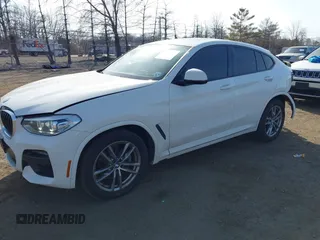 2021 BMW X4 xDrive30i z VIN 5UX2V1C01M9F26524, wystawiony jako IAAI lot #41805153 z przebiegiem 40 353 mil mil oraz . Historia ofert i sprzedaży dostępna na DreamBid. Obrazek 2.