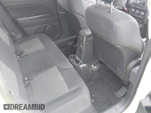 2011 Jeep Compass Latitude with VIN 1J4NT1FB1BD192076, listed as a IAAI auction lot 42121930 with 148,548 mi miles. Bid and sale history available at carsss.com. Image 8.