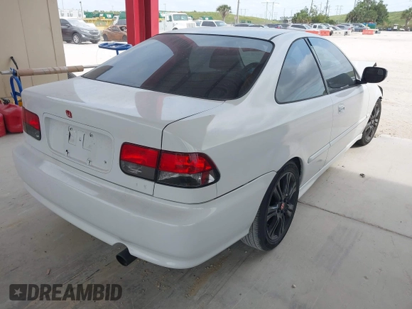 2000 Honda Civic EX with VIN 1HGEJ8242YL102879, listed as a IAAI auction lot 39103013 with 197,220 mi miles and . Bid and sale history available at DreamBid. Image 4.