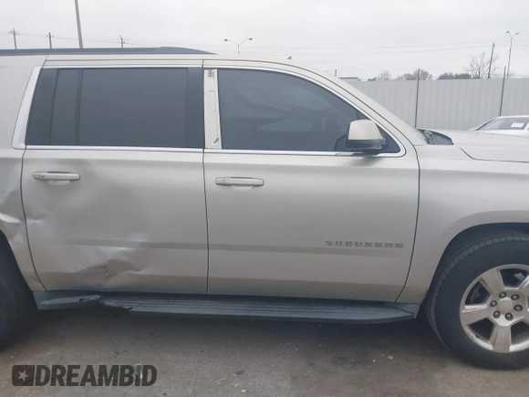 2015 Chevrolet Suburban LT with VIN 1GNSCJKC4FR744208, listed as a IAAI auction lot 41612915 with 87,445 mi miles and . Bid and sale history available at DreamBid. Image 13.