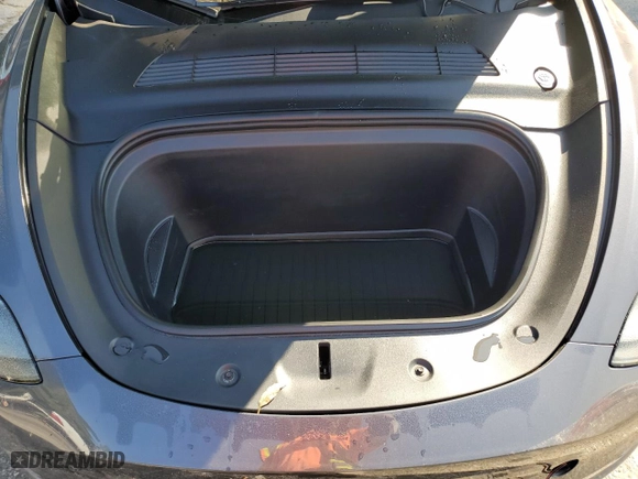2022 Tesla Model Y Performance with VIN 7SAYGDEF4NF521270, listed as a Copart auction lot 74144264 with 0 mi miles and Salvage Title. Bid and sale history available at carsss.com. Image 11.