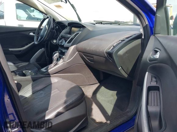 2013 Ford Focus SE with VIN 1FADP3F27DL138703, listed as a IAAI auction lot 41797537 with 128,070 mi miles. Bid and sale history available at carsss.com. Image 5.