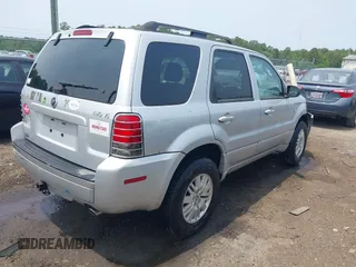 2005 Mercury Mariner Luxury z VIN 4M2CU57135DJ23718, wystawiony jako IAAI lot #42441869 z przebiegiem 179 378 mil mil oraz . Historia ofert i sprzedaży dostępna na DreamBid. Obrazek 4.