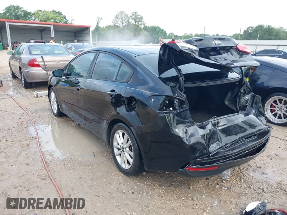 2017 Kia Forte LX with VIN 3KPFL4A79HE132178, listed as a IAAI auction lot 42091470 with 165,733 mi miles. Bid and sale history available at carsss.com. Image 3.