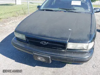 1996 Chevrolet Caprice Classic 1SA Special Value Pkg with VIN 1G1BL52PXTR141223, listed as a IAAI auction lot 41693524 with 1 mi miles. Bid and sale history available at carsss.com. Image 6.