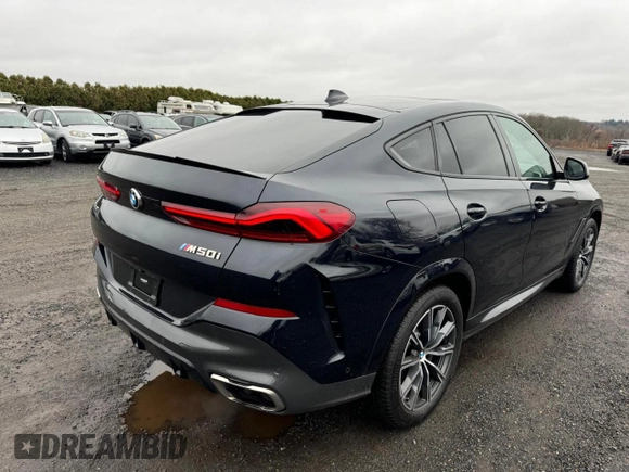 2021 BMW X6 M50i z VIN 5UXCY8C02M9D95172, wystawiony jako Copart lot #84796854 z przebiegiem 75 299 mil mil oraz Czysty tytuł • Clean title. Historia ofert i sprzedaży dostępna na DreamBid. Obrazek 3.
