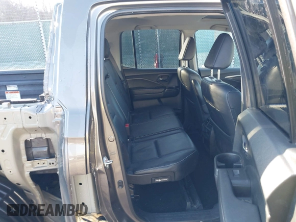 2022 Honda Ridgeline RTL-E with VIN 5FPYK3F79NB005152, listed as a IAAI auction lot 41754891 with 60,191 mi miles and . Bid and sale history available at DreamBid. Image 8.