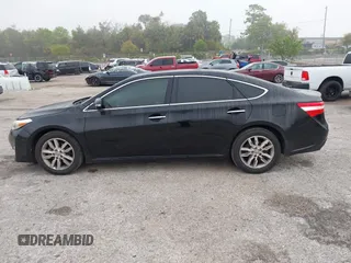 2014 Toyota Avalon Limited z VIN 4T1BK1EB3EU132555, wystawiony jako IAAI lot #41883284 z przebiegiem 263 238 mil mil oraz . Historia ofert i sprzedaży dostępna na DreamBid. Obrazek 14.