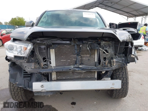 2022 Toyota Tacoma SR with VIN 3TYSX5EN8NT016817, listed as a IAAI auction lot 42140136 with 52,825 mi miles and . Bid and sale history available at DreamBid. Image 6.