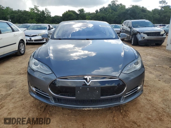 2013 Tesla Model S с VIN 5YJSA1CG6DFP21533, выставлен на аукционе Copart как лот 60850815 с пробегом 24 220 миль миль и На запчасти • Non repairable. История ставок и продаж доступна на DreamBid. Изображение 5.