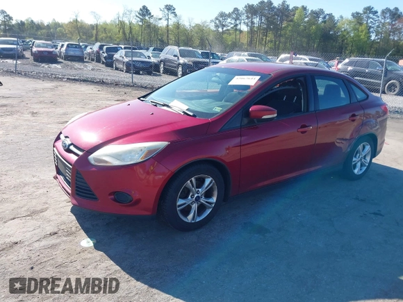 2014 Ford Focus SE with VIN 1FADP3F27EL202224, listed as a IAAI auction lot 42067644 with 174,674 mi miles. Bid and sale history available at carsss.com. Image 2.
