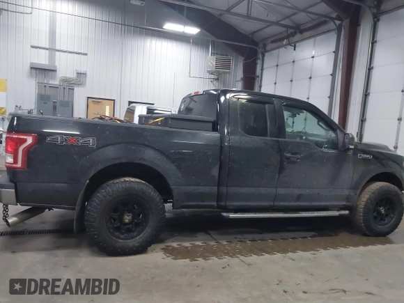 2015 Ford F-150 XLT with VIN 1FTFX1EF9FFB74356, listed as a IAAI auction lot 41443778 with 168,086 mi miles. Bid and sale history available at carsss.com. Image 13.