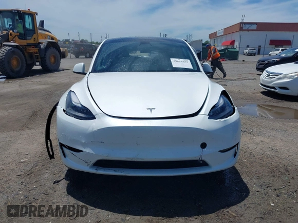 2023 Tesla Model Y Long Range z VIN 7SAYGDEE9PF753051, wystawiony jako IAAI lot #39615839 z przebiegiem Nie podano mil oraz . Historia ofert i sprzedaży dostępna na DreamBid. Obrazek 11.