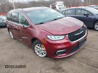2021 Chrysler Pacifica Touring L with VIN 2C4RC1BG6MR597911, listed as a IAAI auction lot 41660729 with 72,004 mi miles and . Bid and sale history available at DreamBid. Image 1.