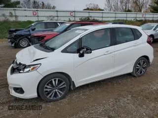 2020 Honda Fit EX-L z VIN 3HGGK5H90LM715193, wystawiony jako Copart lot #75605024 z przebiegiem 72 950 mil mil oraz Czysty tytuł • Clean title. Historia ofert i sprzedaży dostępna na DreamBid. Obrazek 1.