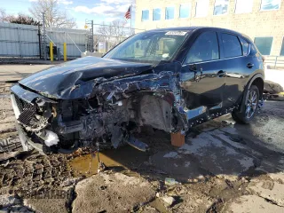 2019 Mazda CX-5 Signature with VIN JM3KFBEY4K0606252, listed as a Copart auction lot 46624995 with 84,965 mi miles and Salvage Title. Bid and sale history available at carsss.com. Image 1.
