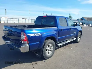2015 Toyota Tacoma with VIN 3TMLU4ENXFM177755, listed as a IAAI auction lot 41867145 with 123,551 mi miles and . Bid and sale history available at DreamBid. Image 4.