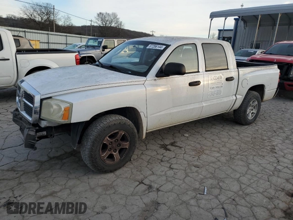 2006 Dodge Dakota SLT with VIN 1D7HE48K46S521050, listed as a Copart auction lot 87286144 with 252,799 mi miles and Salvage Title. Bid and sale history available at DreamBid. Image 1.