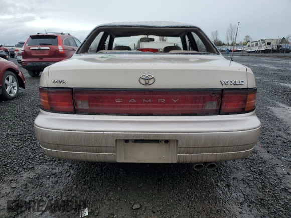 1994 Toyota Camry XLE with VIN JT2GK13E4R0053523, listed as a Copart auction lot 46646995 with 172,091 mi miles and Salvage Title. Bid and sale history available at carsss.com. Image 6.