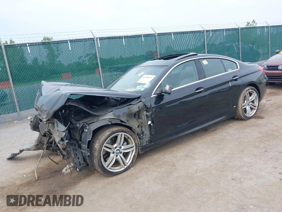 2013 BMW 6 Series 650i xDrive with VIN WBA6B4C56DD098367, listed as a IAAI auction lot 39926691 with 99,178 mi miles. Bid and sale history available at carsss.com. Image 2.