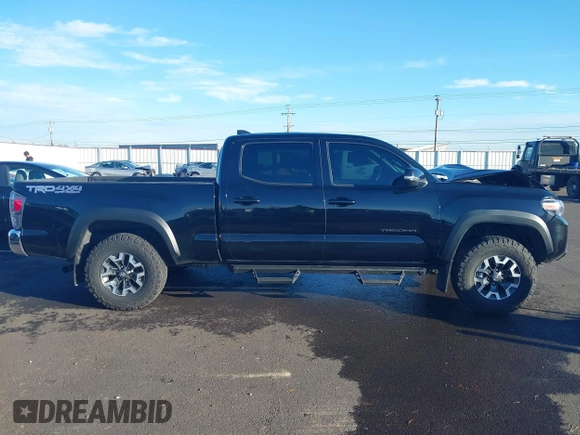 2021 Toyota Tacoma 4WD SR5 with VIN 3TMDZ5BN6MM111605, listed as a IAAI auction lot 41265774 with 68,043 mi miles. Bid and sale history available at carsss.com. Image 14.
