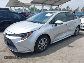 2022 Toyota Corolla Hybrid LE with VIN JTDEAMDE6NJ056705, listed as a IAAI auction lot 42032119 with 197,030 mi miles. Bid and sale history available at carsss.com. Image 17.