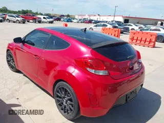 2013 Hyundai Veloster w/Black Int with VIN KMHTC6AD9DU135318, listed as a IAAI auction lot 42632212 with 97,485 mi miles and . Bid and sale history available at DreamBid. Image 3.
