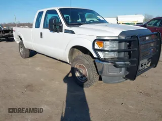 2015 Ford Super Duty F-250 SRW XLT with VIN 1FT7X2B69FEB71297, listed as a IAAI auction lot 41665201 with 214,931 mi miles. Bid and sale history available at carsss.com. Image 1.