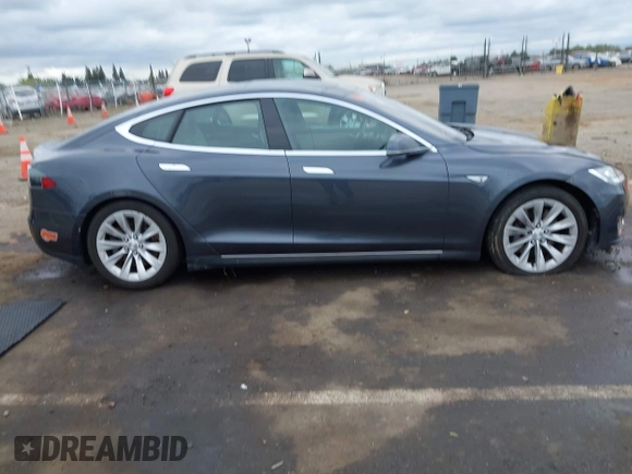 2016 Tesla Model S 90D with VIN 5YJSA1E27GF129824, listed as a IAAI auction lot 42058080 with 113,171 mi miles and . Bid and sale history available at DreamBid. Image 14.