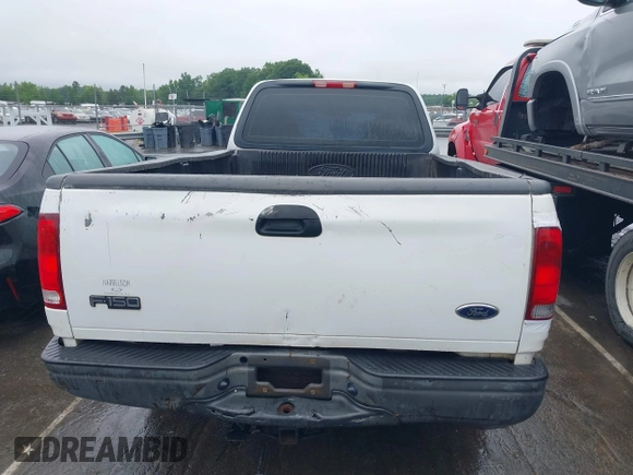 2002 Ford F-150 XL with VIN 1FTRF17242NB86232, listed as a IAAI auction lot 42336859 with 119,321 mi miles and . Bid and sale history available at DreamBid. Image 16.