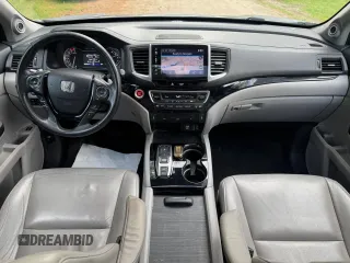 2018 Honda Pilot Touring z VIN 5FNYF6H94JB070661, wystawiony jako Copart lot #60926415 z przebiegiem 205 538 mil mil oraz Czysty tytuł • Clean title. Historia ofert i sprzedaży dostępna na DreamBid. Obrazek 9.