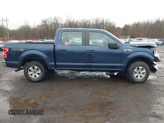 2019 Ford F-150 XL with VIN 1FTEW1EB3KFB10433, listed as a IAAI auction lot 41520139 with 104,405 mi miles and . Bid and sale history available at DreamBid. Image 13.
