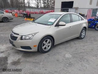 2014 Chevrolet Cruze 1LT with VIN 1G1PC5SB8E7442100, listed as a IAAI auction lot 42092820 with 113,178 mi miles. Bid and sale history available at carsss.com. Image 2.