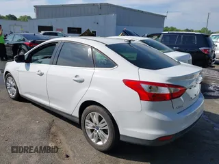 2012 Ford Focus SEL with VIN 1FAHP3H20CL470527, listed as a IAAI auction lot 42028826 with 165,197 mi miles. Bid and sale history available at carsss.com. Image 3.