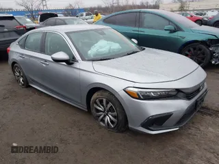 2023 Honda Civic Sedan LX with VIN 2HGFE2F27PH569600, listed as a IAAI auction lot 41439524 with 14,151 mi miles. Bid and sale history available at carsss.com. Image 1.
