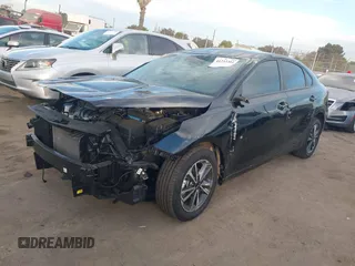 2024 Kia Forte LXS with VIN 3KPF24AD0RE801500, listed as a IAAI auction lot 41233301 with 4,925 mi miles. Bid and sale history available at carsss.com. Image 2.