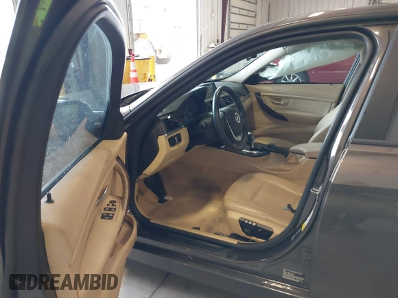 2015 BMW 3 Series 328i with VIN WBA3A5C57FF609734, listed as a IAAI auction lot 41392336 with 121,378 mi miles. Bid and sale history available at carsss.com. Image 5.